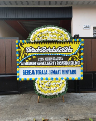Papan Bunga Duka di Juru Banu